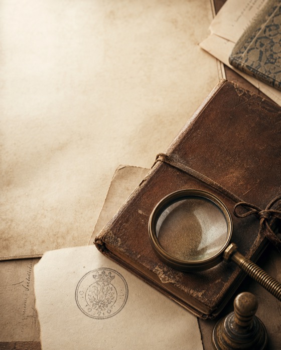 Archive folio and magnifying glass